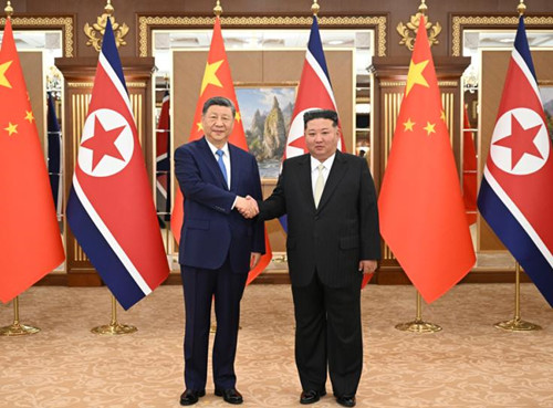 习近平同金正恩互致贺电